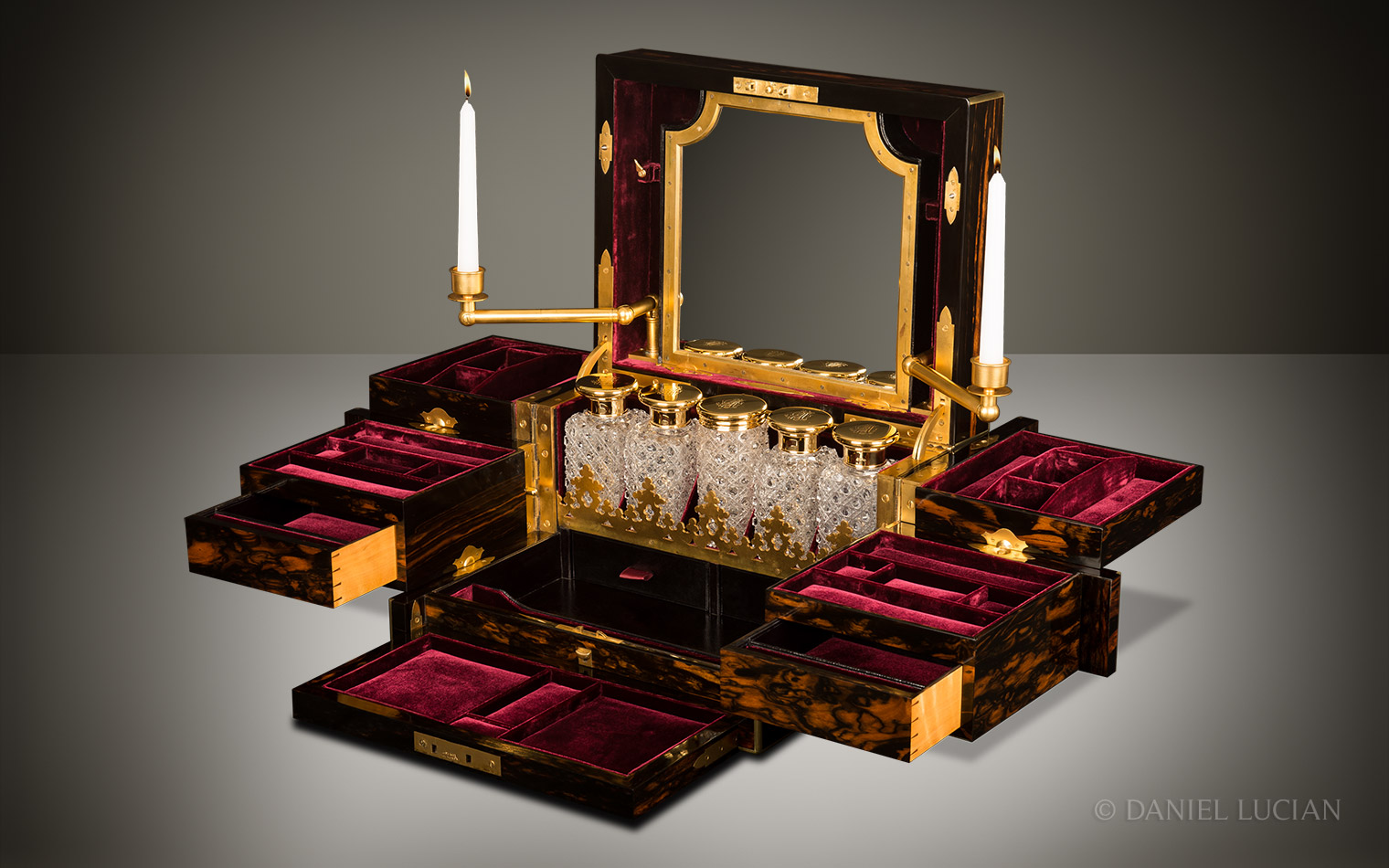 Asprey Antique Jewellery Box with Betjemann Patent mechanism and candlesticks.