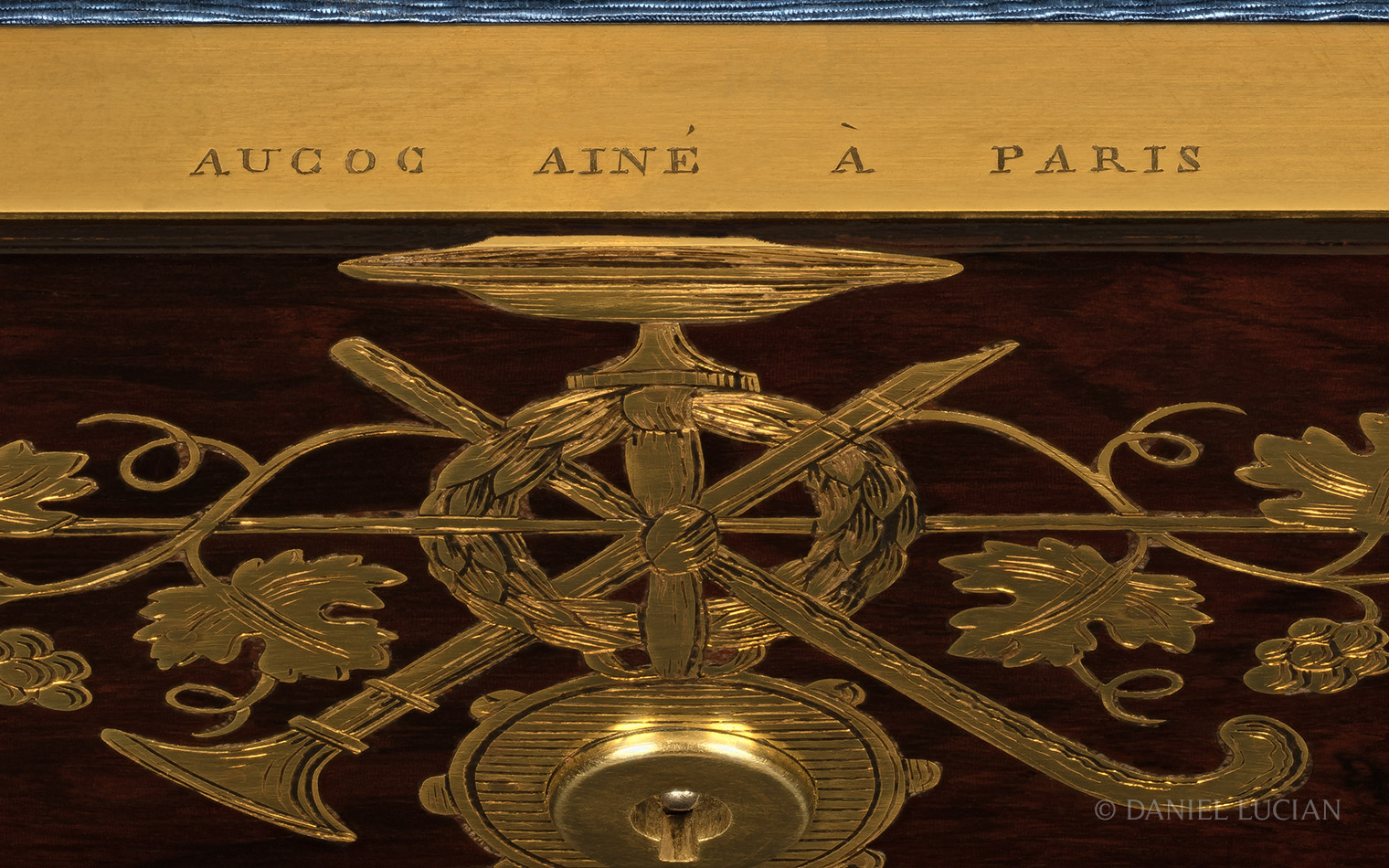 ‘Aucoc Ainé à Paris’ engraved manufacturer’s mark on a French antique jewellery box in rosewood with grapevine brass inlay.