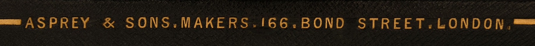 Asprey & Sons gold tooled manufacturer’s mark from an antique dressing case.