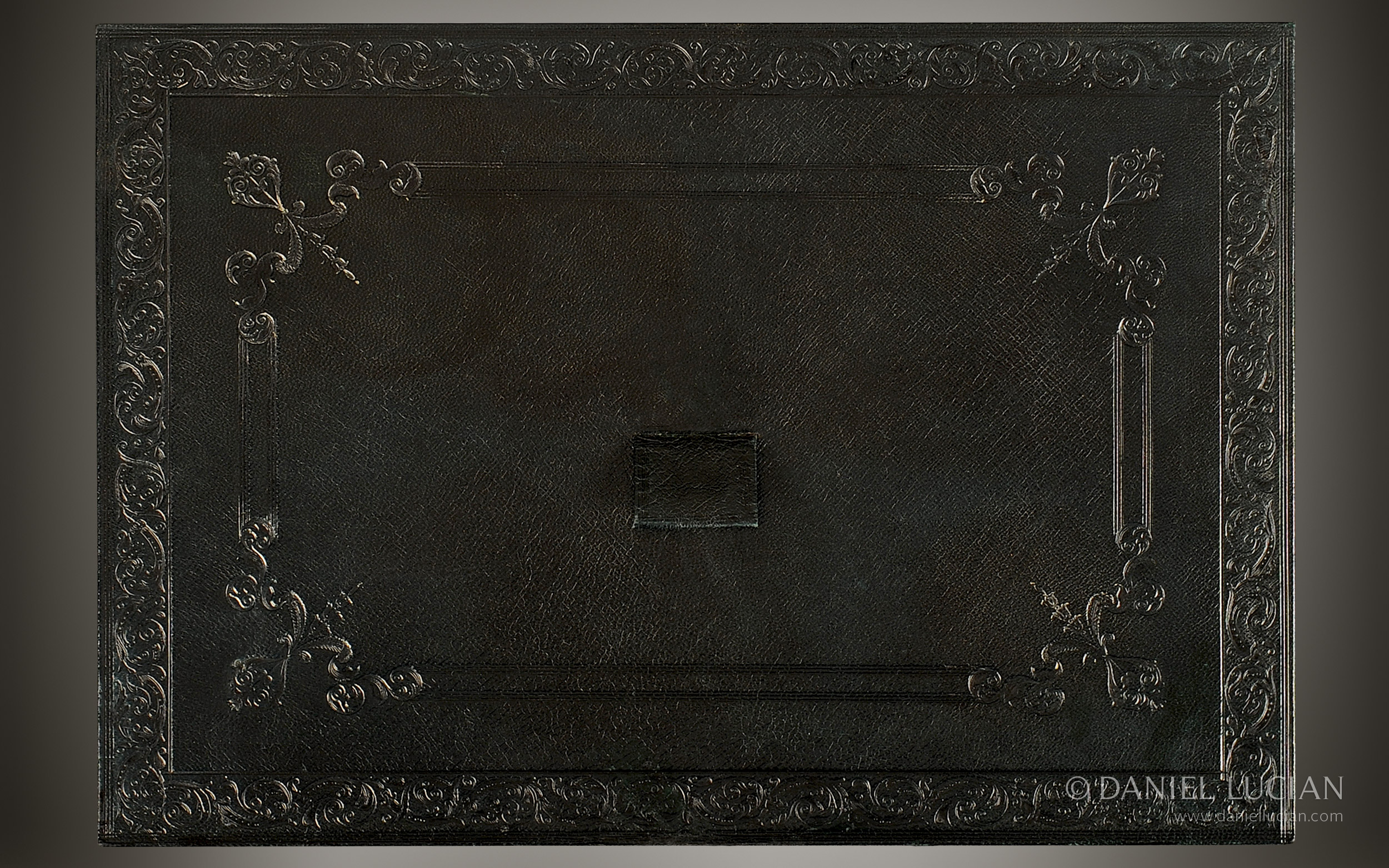Antique blind tooled leather drawer lid from a jewellery box in amboyna, manufactured by Howell, James & Co.