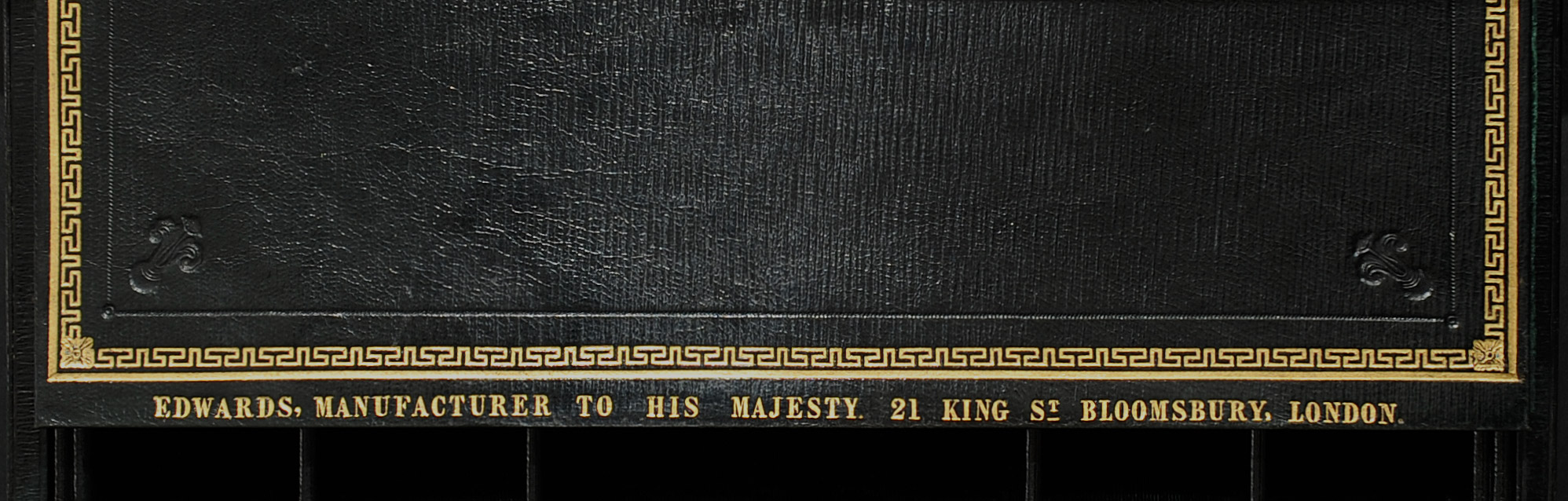 Gold tooled design and manufacturer’s mark of ‘Edwards, Manufacturer to His Majesty, 21 King St, Bloomsbury, London