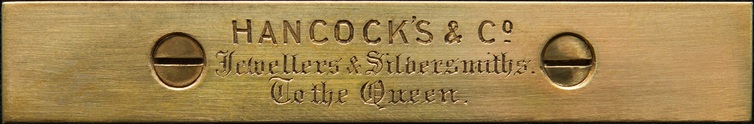 Hancock’s & Co engraved brass retailer’s plate.