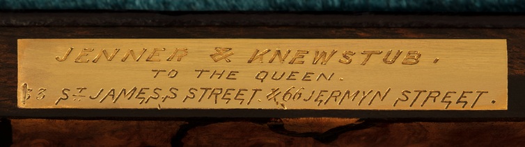 Jenner & Knewstub manufacturer’s plate from a miniature antique jewellery box in burr walnut.