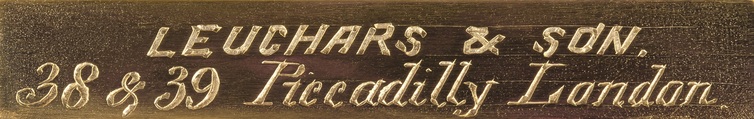 ‘Leuchars & Son. 38 & 39 Piccadilly London.’ engraved brass manufacturer’s plate from an antique jewellery case in coromandel with silver mounted monograms.
