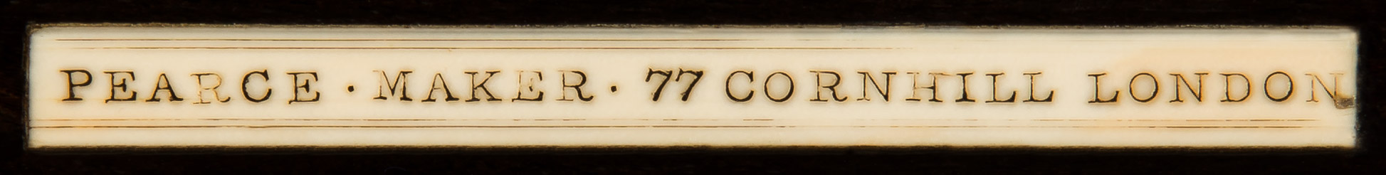 An ivory manufacturer’s plaque inset to the front rim of the drawer reads, ‘Pearce. Maker. 77 Cornhill London’.