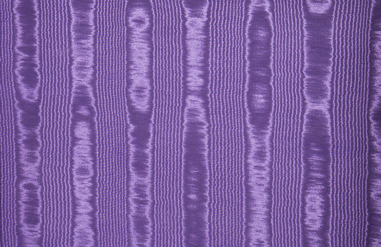 Purple moiré silk from an antique jewellery box in coromandel with cantilever mechanism.
