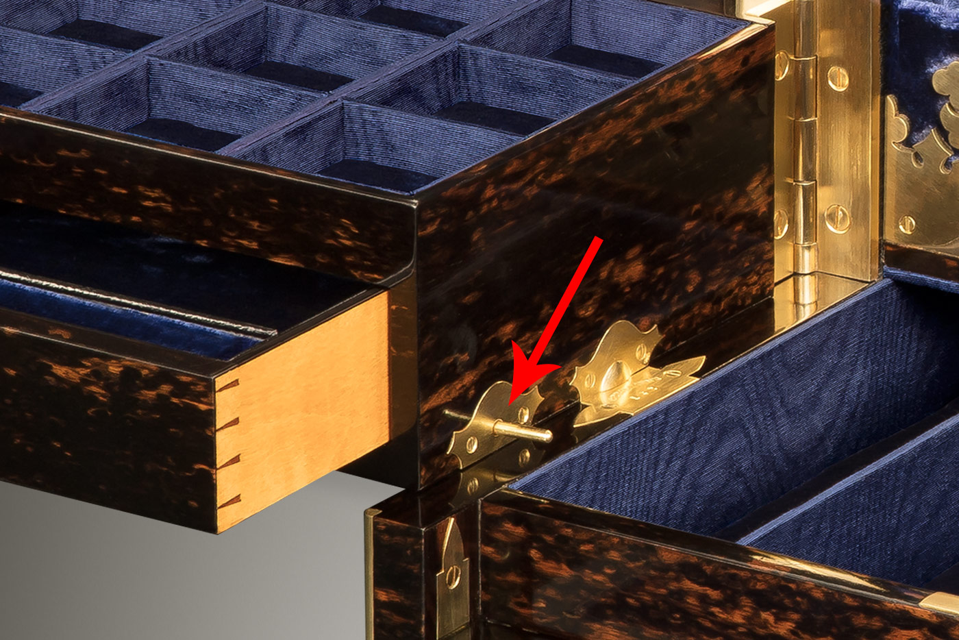 Spring-loaded cantilever release mechanism from an antique jewellery box in coromandel with Betjemann Patent mechanism, by Jenner & Knewstub.