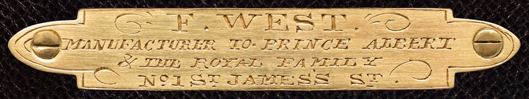 ‘F. West – Manufacturer To Prince Albert & The Royal Family – No.1 St James’s St.’ engraved brass manufacturer’s plate from an antique dressing case in coromandel with silver fittings, by Fitzmaurice West.